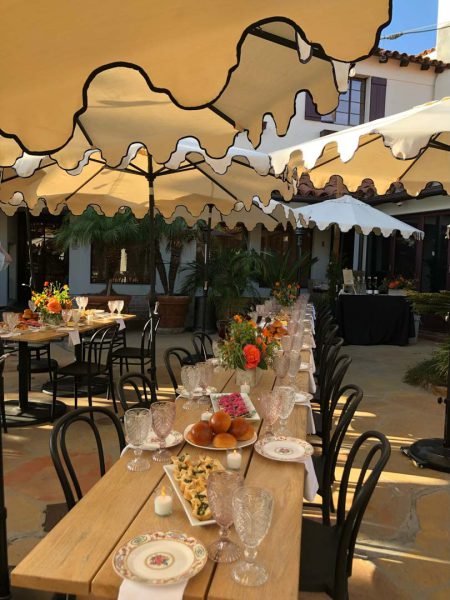 A small, private event table setting on the patio at Frequency Wine Company in Santa Barbara